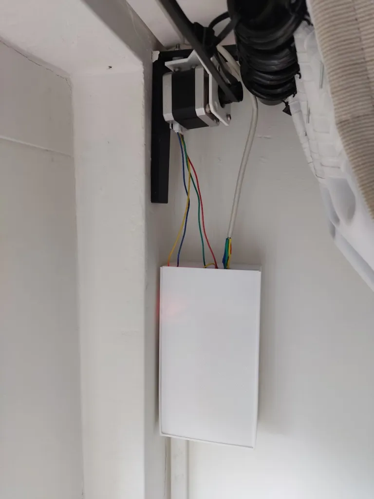 Picture of the box with the ESP8266, A4988 stepper drivers, power supply and the right stepper
